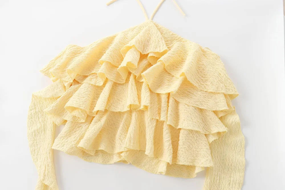 Textured halter crop top with ruffles Women's short yellow sleeveless top with sexy streamers for summer 2025 ETJ