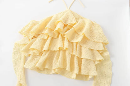 Textured halter crop top with ruffles Women's short yellow sleeveless top with sexy streamers for summer 2025 ETJ