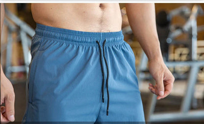 Mens Gym Fitness Running Sweatpants Workout Athletic Long Pants Outdoor Training Sports Trousers Elastic Waist Zipper Pockets