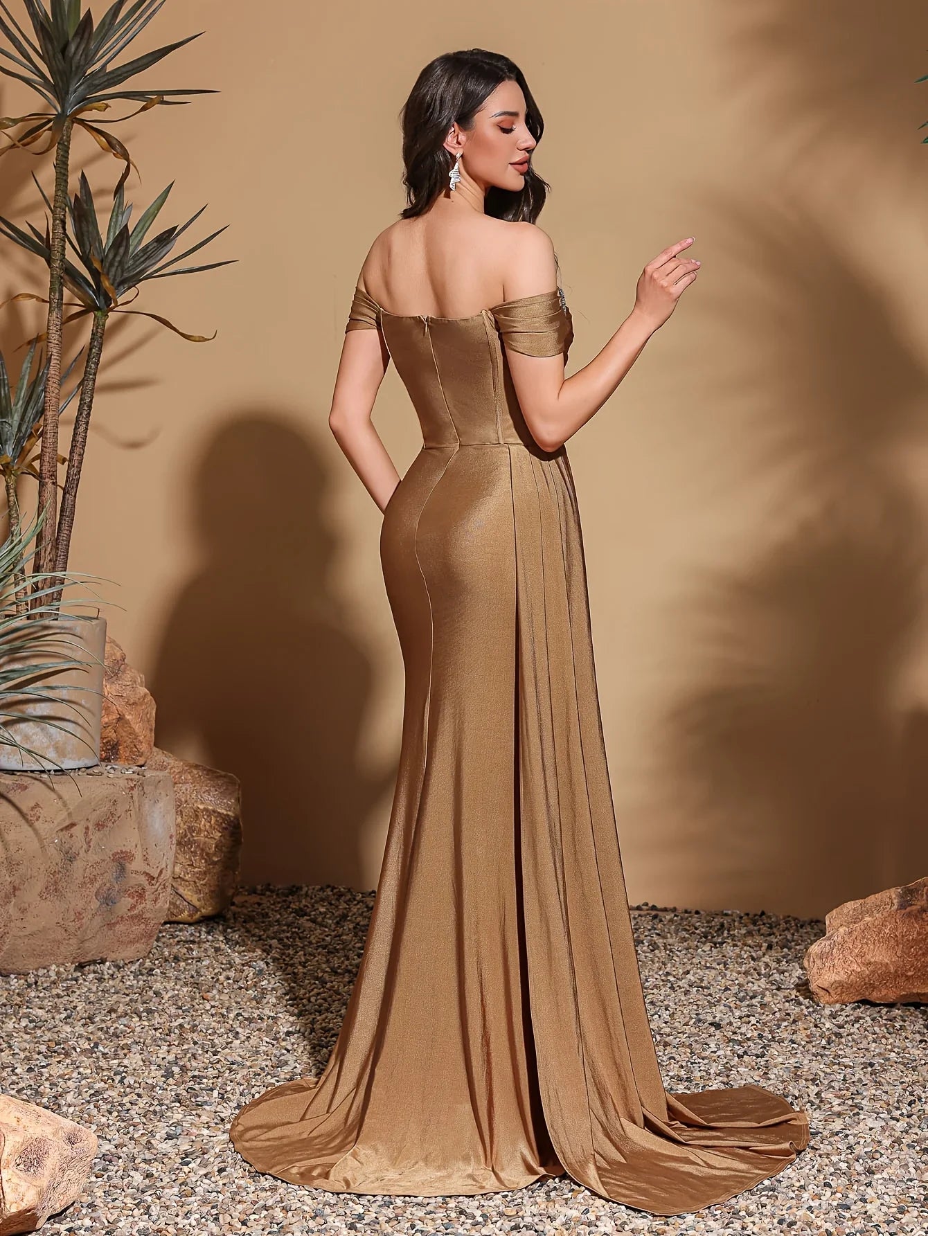 One-shoulder dress with rhinestone embellishments, side flaps and slits