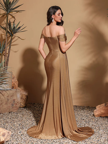 One-shoulder dress with rhinestone embellishments, side flaps and slits
