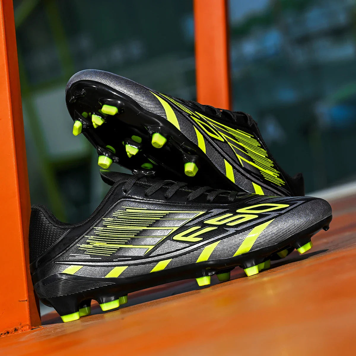 New durable and breathable football shoes with FG/AG studs suitable for all seasons of training and competition