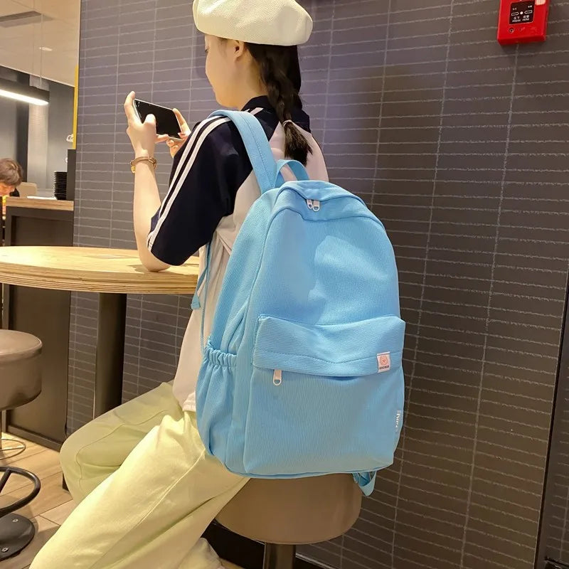 Sweet soft girl solid color large capacity student backpack new style for men and women college students simple trendy