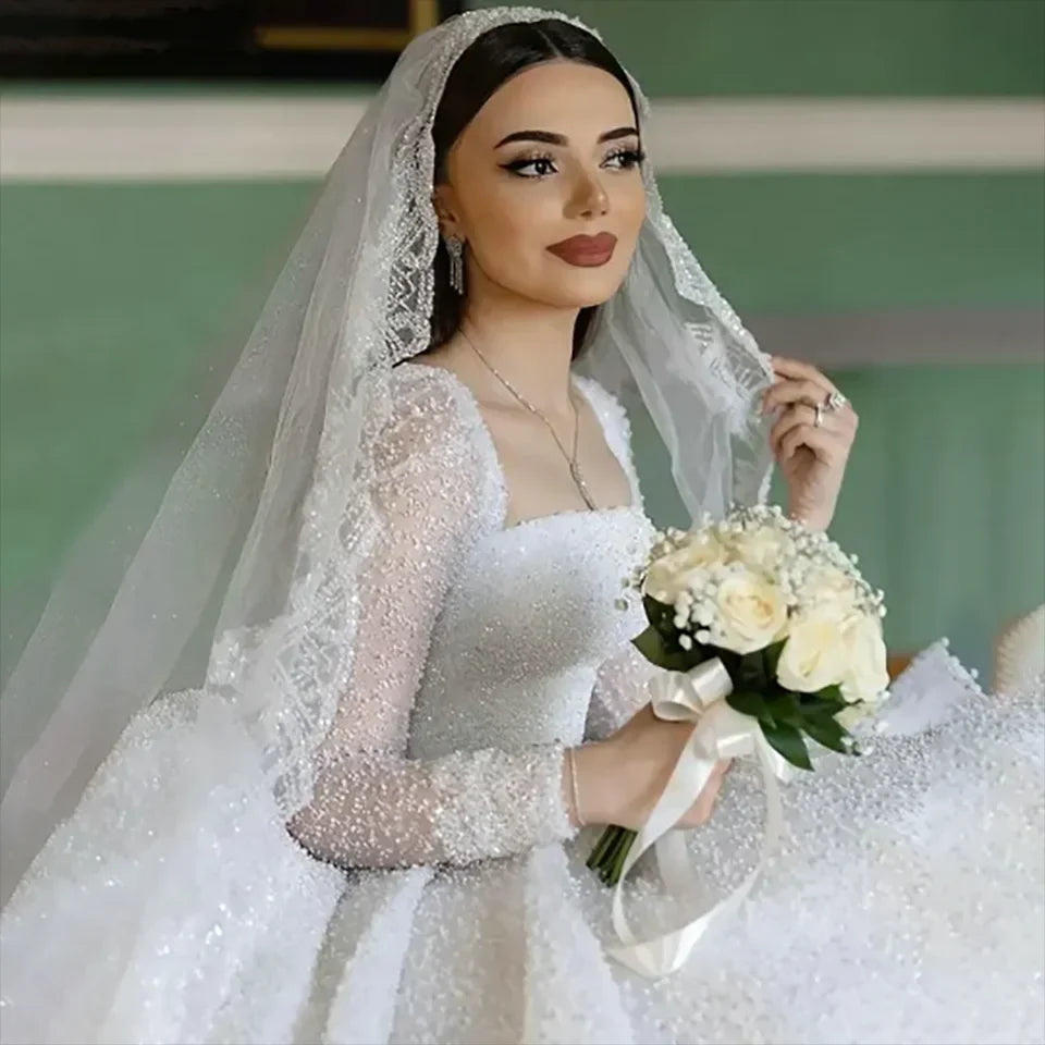 Customized Gorgeous Beaded Sequin Boat Neck Ball Gown Wedding Dresses 2025 Long Sleeves Court Train Tulle Bridal Gowns