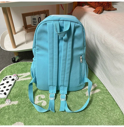 Sweet soft girl solid color large capacity student backpack new style for men and women college students simple trendy
