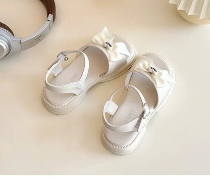 2025 New Children's Sandals Summer Bow Princess Casual Shoes Children's Soft Bottom Beach Flat Shoes Fashionable and Versatile