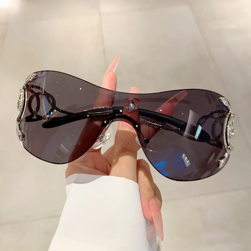 Y2K Rimless Luxury Brand Designer Sunglasses Women For Men One Piece Trendy Oversized Sun Glasses Metal Snake Pink Punk Shades
