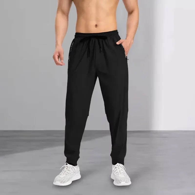 Ice silk pants men's quick drying elastic trend casual pants ultra-thin ice sports pants