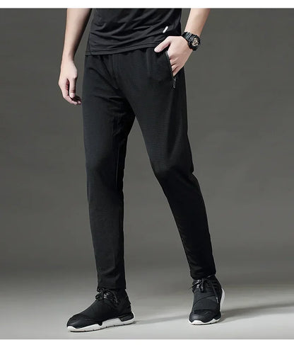 High quality Mesh hole Refrigeration Fitness Sports Pants Men Elastic Breathable Sweat Running Training Gym Basketball Trousers