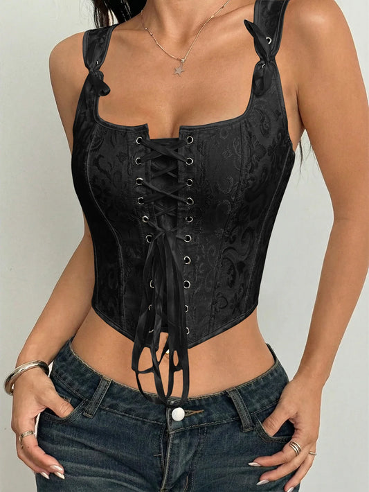 A black jacquard boning corset with laces, perfect for a sophisticated look. A sexy, fitted camisole top suitable for dates, cas