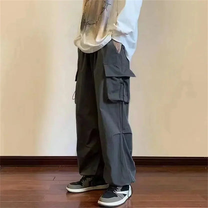 Streetwear 2025 New Spring Harem Multicolored Casual Pants Men Elastic Waist Solid Color Cargo Pants Multi Pocket Baggy Pants