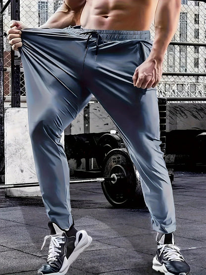 Men's waist drawstring quick drying high elasticity solid color sports training outdoor pants with zipper pocket