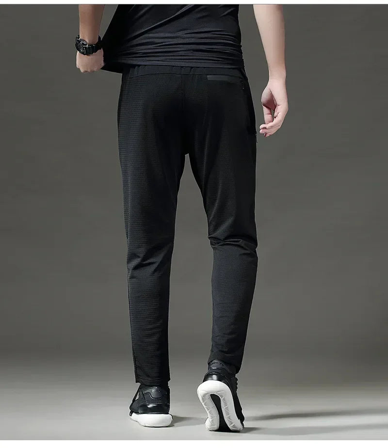 High quality Mesh hole Refrigeration Fitness Sports Pants Men Elastic Breathable Sweat Running Training Gym Basketball Trousers