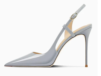 New silver patent leather flat buckle sandals with pointed edges and slim heels, stylish and stylish, worn in the backless style