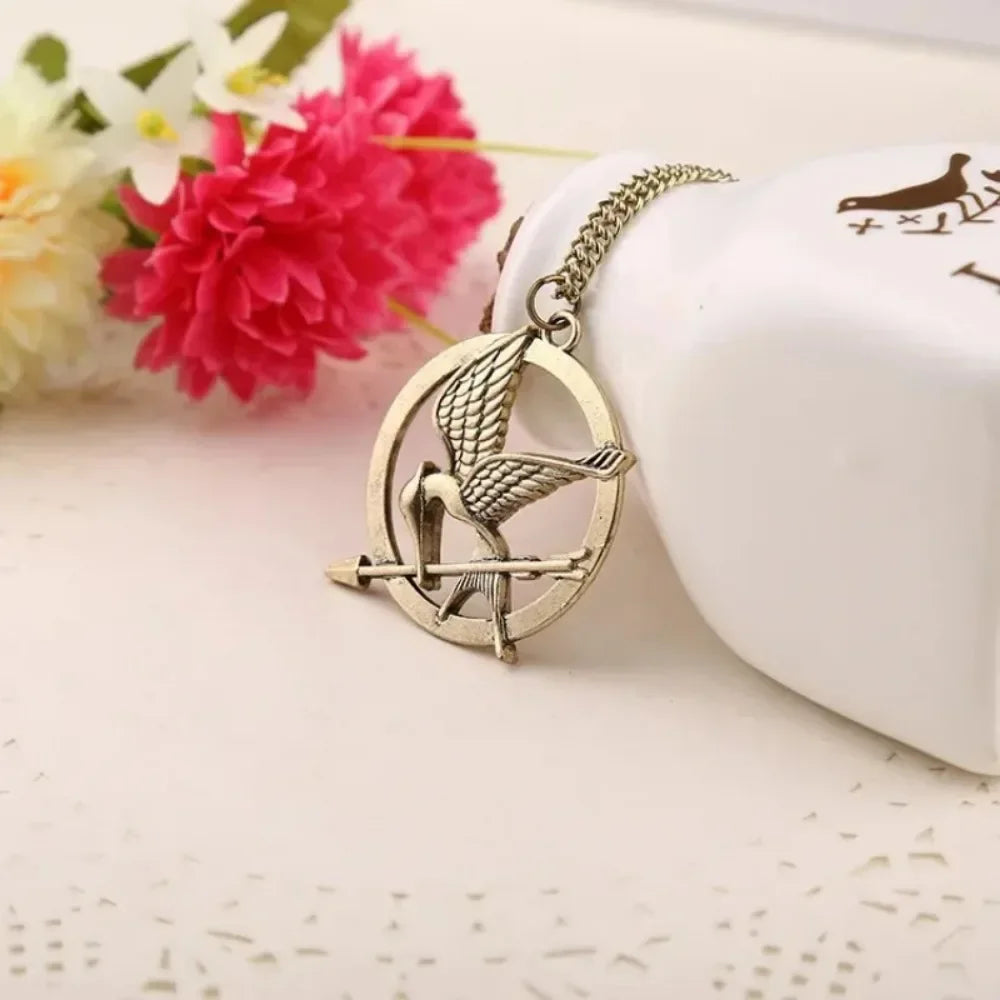Movie and TV Hunger Games Bird Peripheral Pendant Necklace Men and Women Gifts 3 Color Pendant Fashion Niche Party Gift Jewelry
