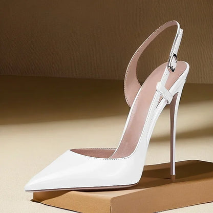 New silver patent leather flat buckle sandals with pointed edges and slim heels, stylish and stylish, worn in the backless style