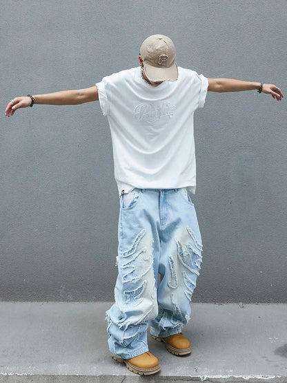 Men's trendy and cool denim wide-leg pants for all seasons featuring unique patchwork patterns, light blue street-stunning style
