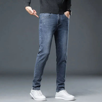 New Autumn/winter 2025 Stretch Wash Jeans for Young Men with Small Straight Elastic WaistJeans Pants Fashion Men's Trousers