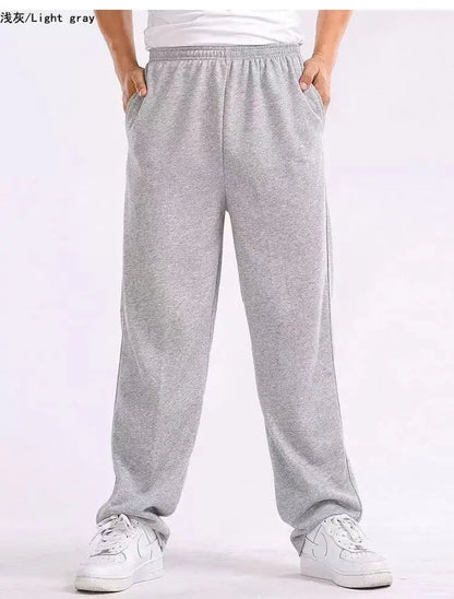 Hot sell Men's Solid Color Blend Sports Pants Elastic Waist Casual Loose Jogging Trousers for Daily Wear And Running