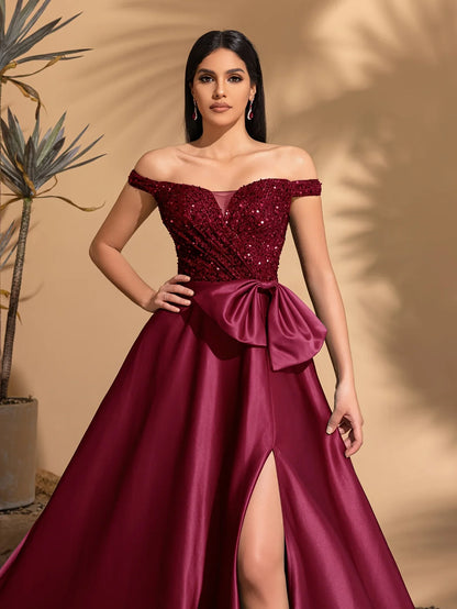 Off-the-shoulder sequined satin elegant dress with bow at waist