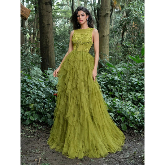 A luxurious party dress for 2026, featuring a round neck, sleeveless design, leaf embroidery, and a multi-layered mesh