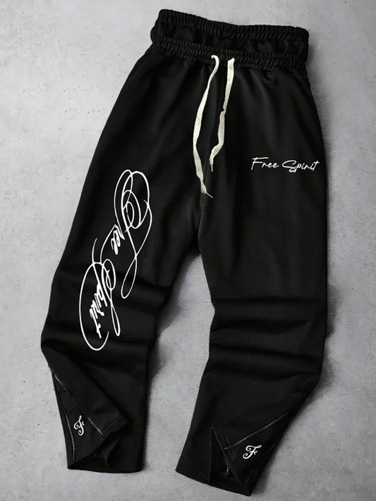 Men's Trendy Street-Style Ins High Street Black Faux Two-Piece Design Sweatpants with Unique Waistband and Ankle Zipper Details. It Is Perfect for Music Festival Outfits or Everyday Wear, Making It a Great Gift for Your Boyfr