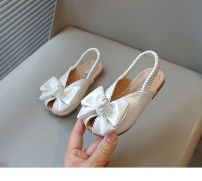 Summer Girl’s Sandals Peep Toe Elastic Band Sliver Beige Kids Sliders Bowknot Graceful Flexiable Trendy Children Shoes Flat