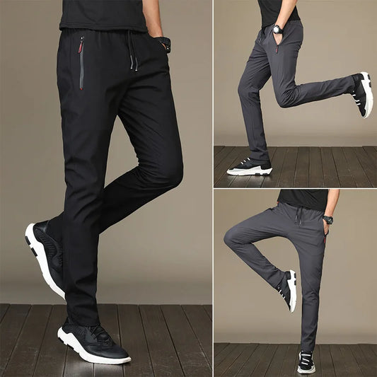 Summer men's ice silk quick drying pocket zipper casual pants slim fit Korean version ice silk sports pants straight tube quick