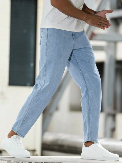 Solid color men's casual jeans, comfortable and breathable for a premium look.