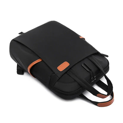 Laptop backpack with multiple pockets, adjustable shoulder straps, zipper closure, multi-purpose, school backpack