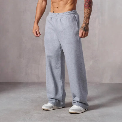 Hot sell Men's Solid Color Blend Sports Pants Elastic Waist Casual Loose Jogging Trousers for Daily Wear And Running