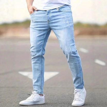Calça Jeans Masculina Skinny Destroyed Primavera 2026 Lavagem Vintage Elástica Biker com Buracos Casual Ajuste Justo Streetwear Jeans Lápis Jogger