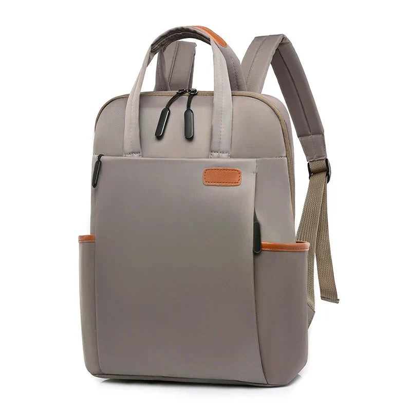 Laptop backpack with multiple pockets, adjustable shoulder straps, zipper closure, multi-purpose, school backpack