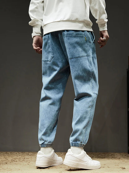 Calça Jeans Masculina Cargo Primavera Verão Levemente Elástica Algodão Denim Jogger Preta Azul Streetwear Folgada