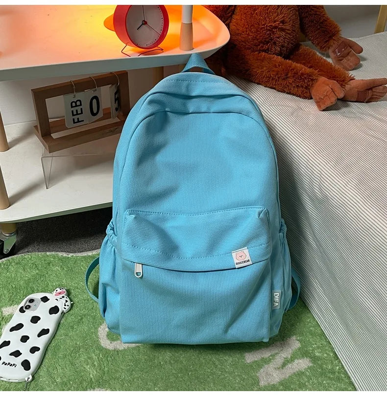 Sweet soft girl solid color large capacity student backpack new style for men and women college students simple trendy