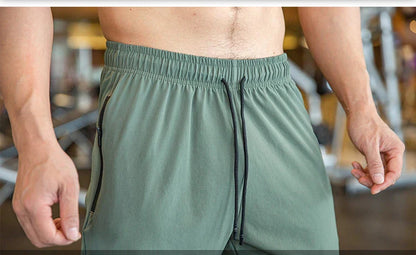 Mens Gym Fitness Running Sweatpants Workout Athletic Long Pants Outdoor Training Sports Trousers Elastic Waist Zipper Pockets