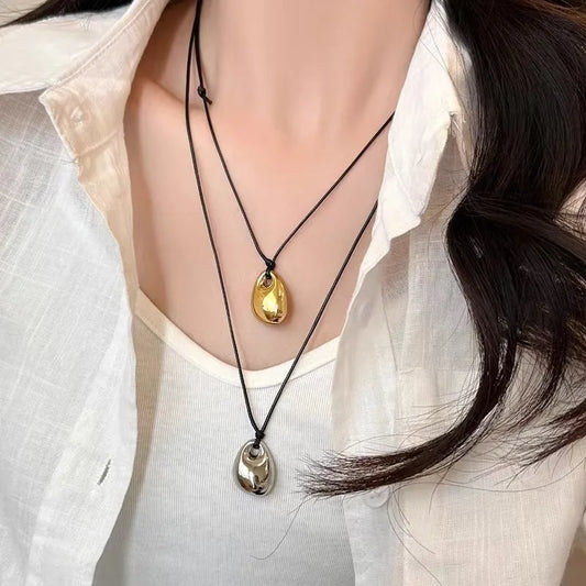 Vintage Irregular Punk Metal Bean Pendant Necklace for Women Adjustable Black Leather Rope Long Clavicle Chain Charm Jewerly