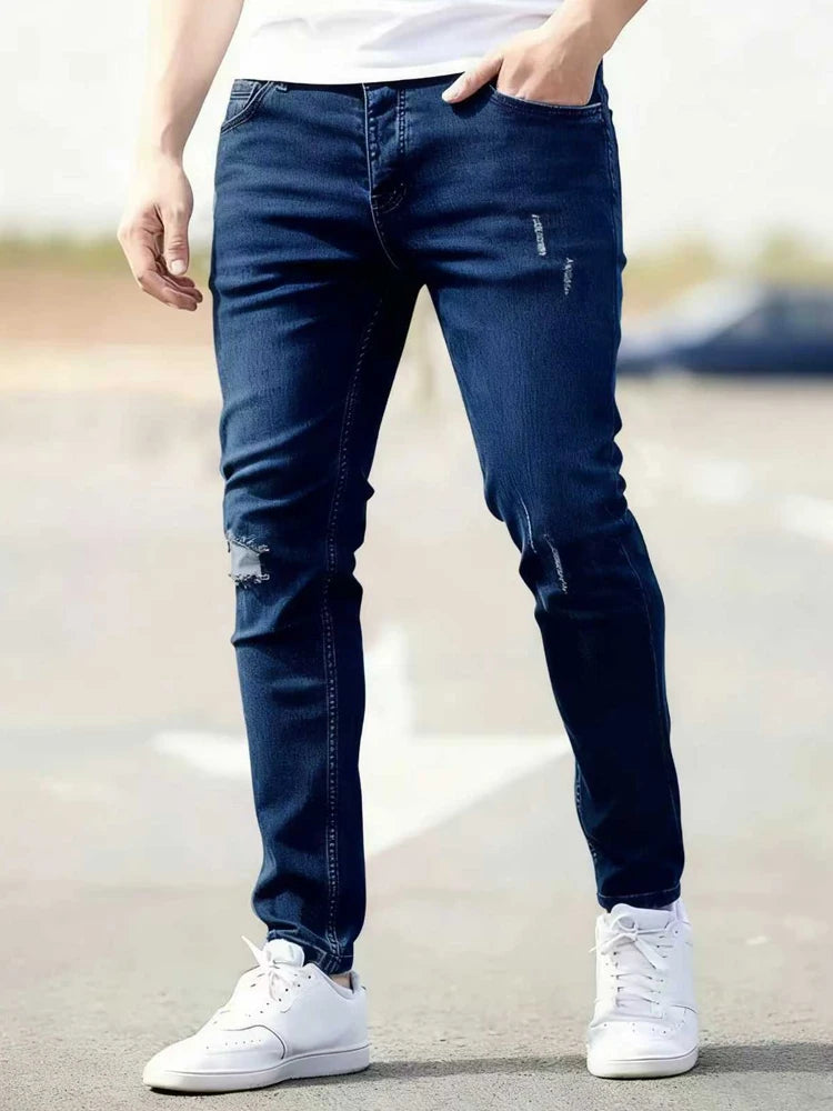 Calça Jeans Masculina Skinny Destroyed Primavera 2026 Lavagem Vintage Elástica Biker com Buracos Casual Ajuste Justo Streetwear Jeans Lápis Jogger
