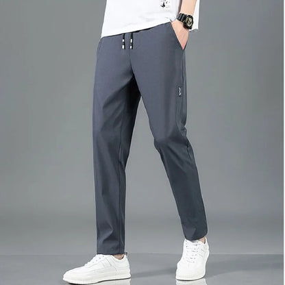 Men's Summer Ice Silk Pants Mesh Breathable Casual Thin Quick Dry Pants Loose Elastic Beam Feet Pants Sports Fitness Trousers