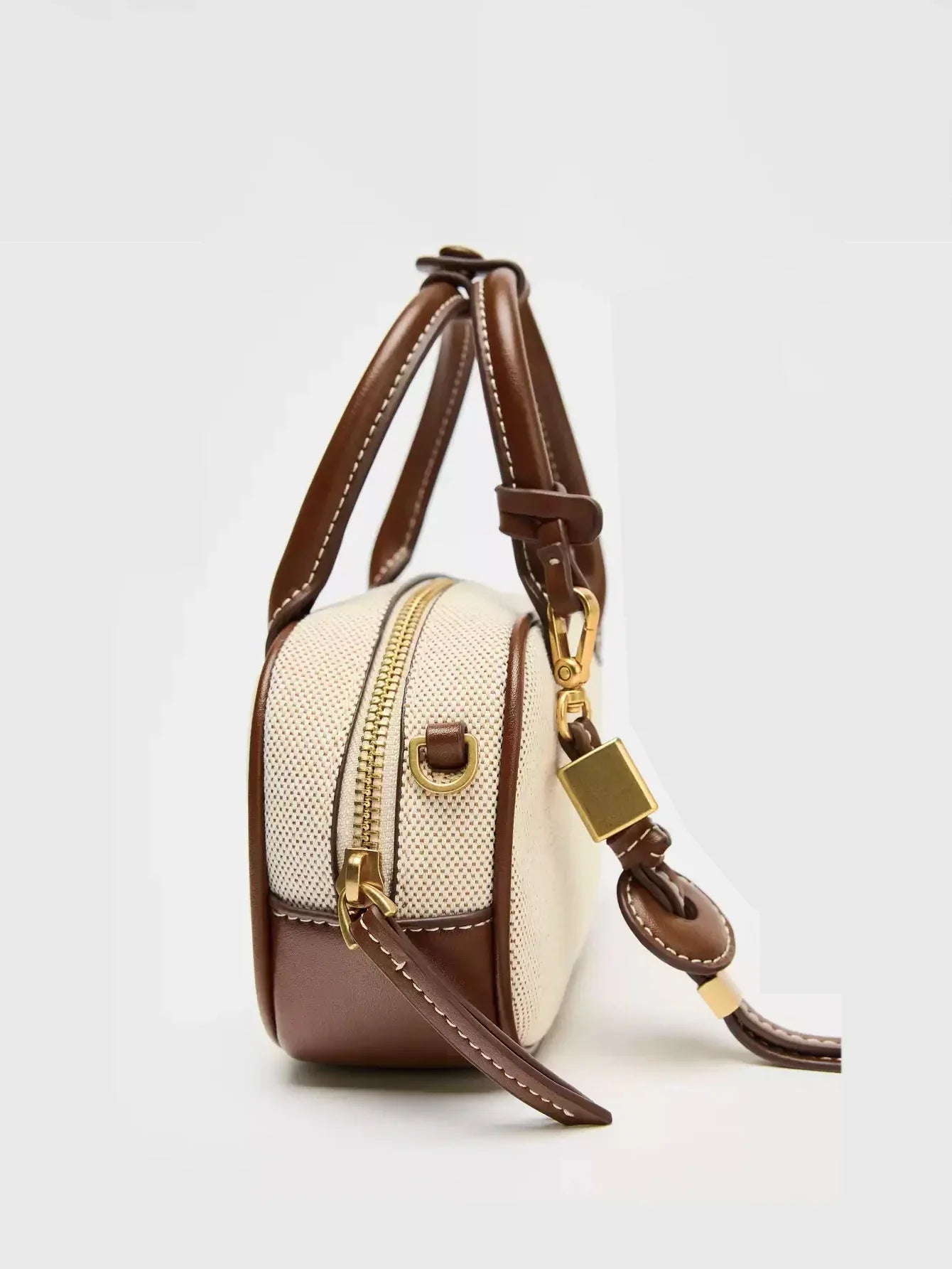 2025 New niche retro color-blocking hand-held small bag, stylish crossbody canvas PU small square bag, single-shoulder bowling b