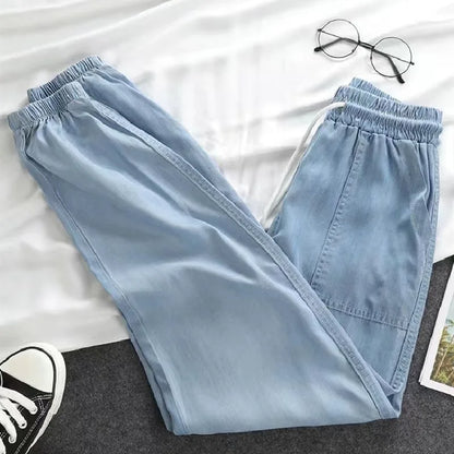 Summer Thin Ice Silk Jeans Women Elastic High Waist Drawstring Harem Pants Loose All-matched Beam Leg Nine Points Denim Pants