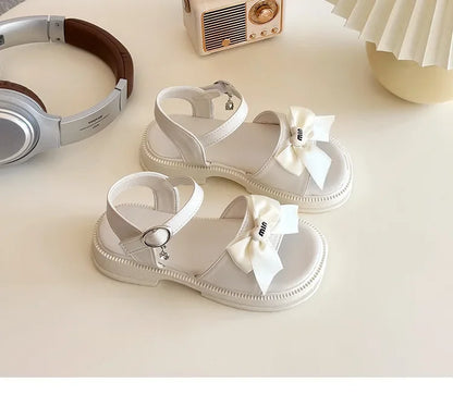 2025 New Children's Sandals Summer Bow Princess Casual Shoes Children's Soft Bottom Beach Flat Shoes Fashionable and Versatile