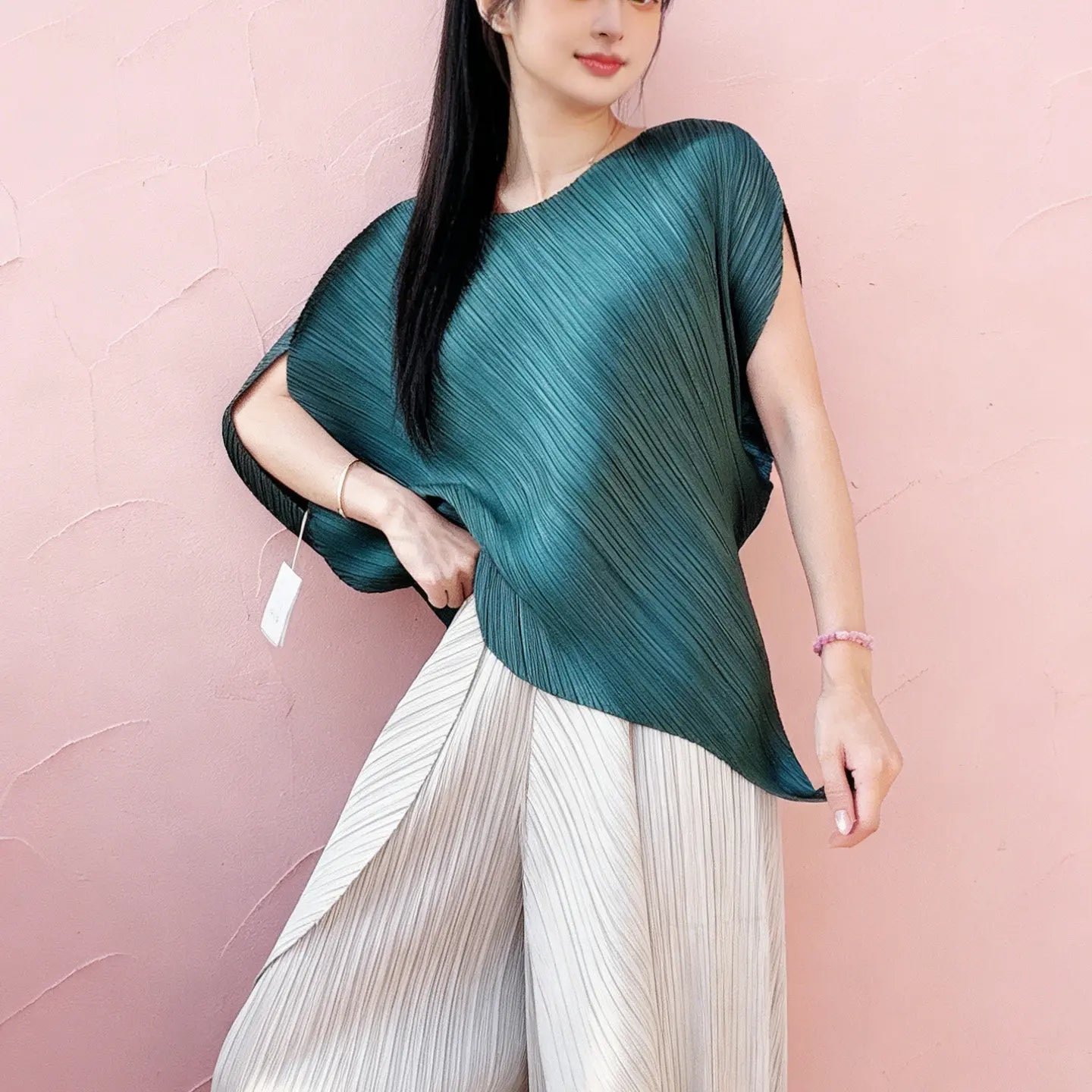 Miyake pleated high-end design fashionable irregular solid color round neck top for women