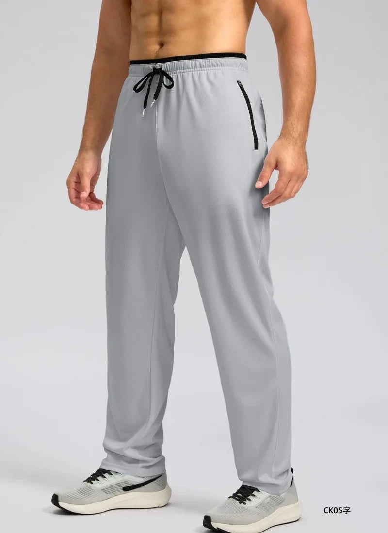 Men's sports pants spring and summer mesh breathable sports pants men's running and jogging sports pants fashionable solid color