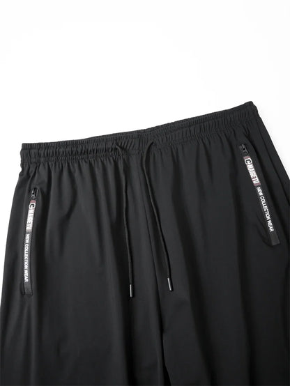 Men's Athletic Stretchy Quick Dry Pants with Zipper Pockets Lightweight Sweatpants for Outdoor Hiking Fishing Running Workout