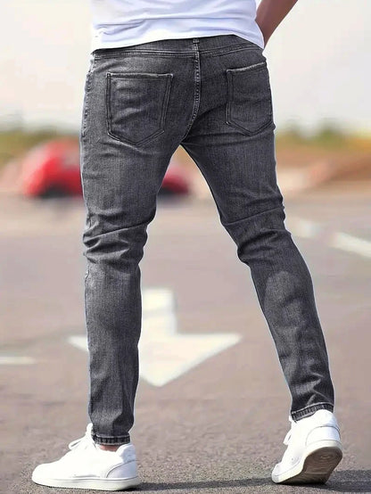 Calça Jeans Masculina Skinny Destroyed Primavera 2026 Lavagem Vintage Elástica Biker com Buracos Casual Ajuste Justo Streetwear Jeans Lápis Jogger