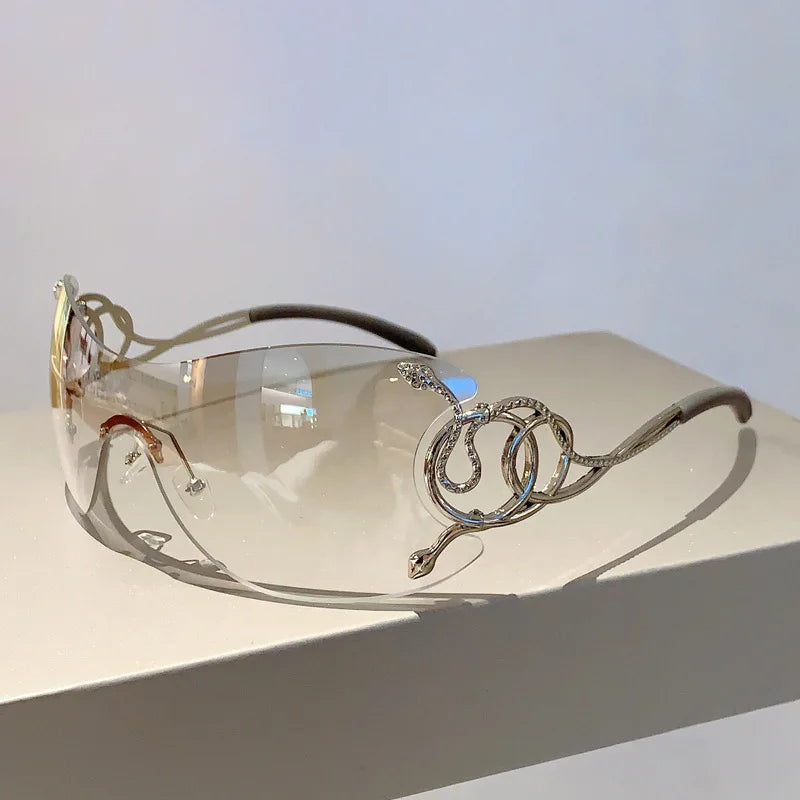 Y2K Rimless Luxury Brand Designer Sunglasses Women For Men One Piece Trendy Oversized Sun Glasses Metal Snake Pink Punk Shades