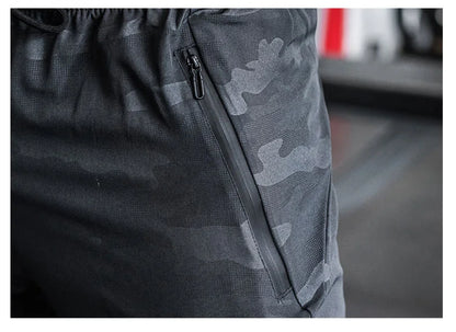 Mens Gym Fitness Running Sweatpants Workout Athletic Long Pants Outdoor Training Sports Trousers Elastic Waist Zipper Pockets