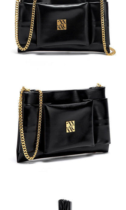 Leather Luxe Sleek Shoulder Bags Gold-Plated Logos Durable Chain Straps Merge High-End Craftsmanship with Urban Style