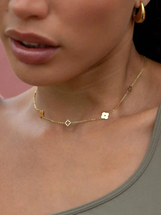 Japan and South Korea style simple stainless steel four-leaf clover plum blossom interlocking pendant necklace for daily wear